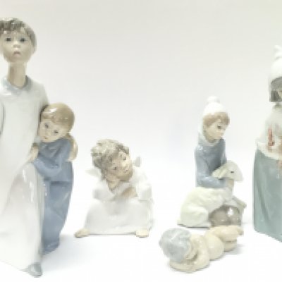 A Collection of Lladro figures and Wade whimsies. This lot cannot be posted