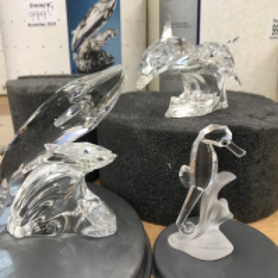 Three boxed Swarovski ocean figures including whale and calf, Limited Edition 1990 "Lead Me" dolphins, and a seahorse