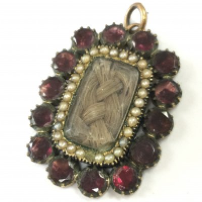 A mourning brooch , postage category A