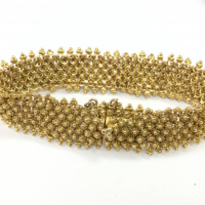 A 14ct gold bracelet , 28.6g total weight. Postage category A