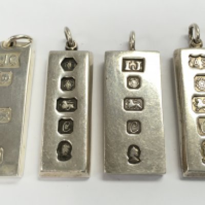Four silver hallmarked ingot pendants , 120g total weight. Postage cat A