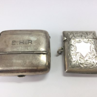 Two silver hallmarked Vesta cases . Postage category A