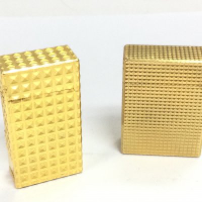 A DuPont and Vinci lighter. Postage category A