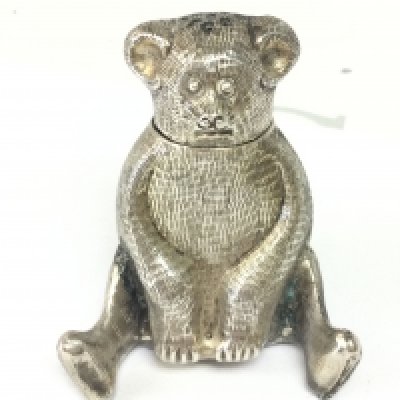 A Victorian novelty silver plated bear pepperette , 5cm tall. Postage category A