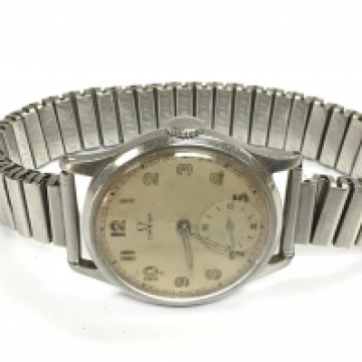 A 1940s chrome plated gents mid size Omega watch . Postage category A