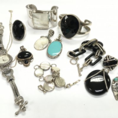A mixed collection of sterling silver and onyx jewellery. Postage category A