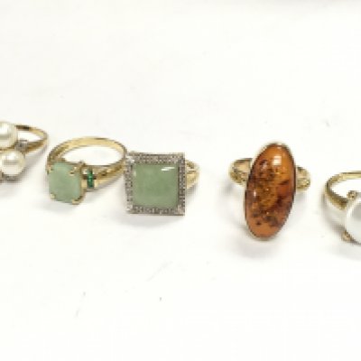 Five 9 carat gold rings set with various stones