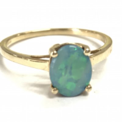 A Opal Solitaire 9ct gold ring, 1.99g . Size S. postage category A