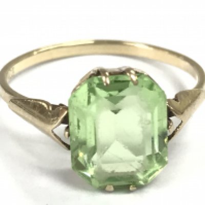 Green baguette stone 9ct gold ring . Size N. 1.7g Postage category A