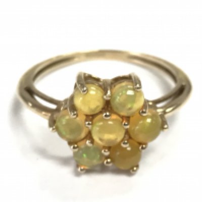 A 9 carat Opal cluster ring .2.3g total weight. Size R Postage category A