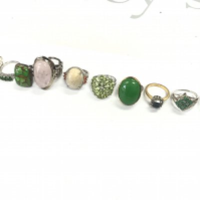 A collection of silver and costume rings . Postage category A