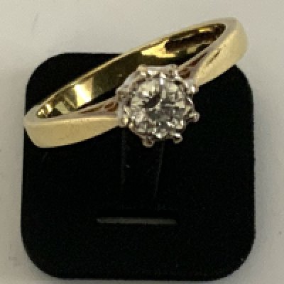 An 18ct yellow gold solitare ring, approx 0.25ct, Size M. (A)