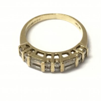 A 9ct gold baguette and round diamond half hoop rings. Size N and 3.3G Postage A