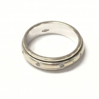 An 18ct white gold diamond set band ring. Size Q and 7.56g. Postage A