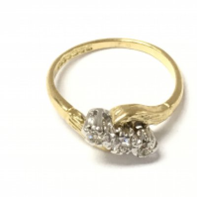 An 18ct gold 3 stone diamond ring. Size J and 2.8g
