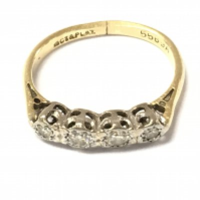 An 18ct gold four stone diamond ring. Size K and 2.75g note ring is bent. Postage A