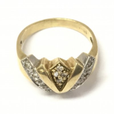 An 18ct yellow and white gold diamond ring. Size L and 4.16g