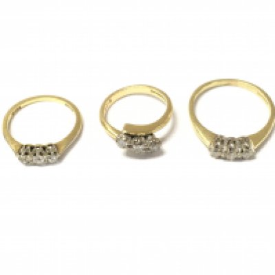 Three 18ct gold 3 stone diamond rings. 9.19g