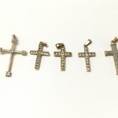 A collection of 9ct gold diamond pendants. 10.92g