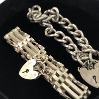 A silver Hallmarked bracelet and a silver gate bracelet . Postage category B