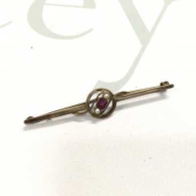 A 9ct gold ruby and pearl set brooch.