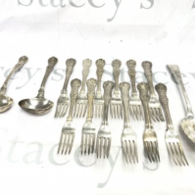 A collection of hallmarked silver cutlery including a vintage berry spoon. 1055g total. Postage B