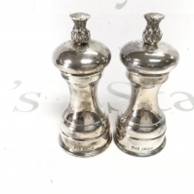 Two silver Sheffield hallmarked mills. Approx 350g. Postage B