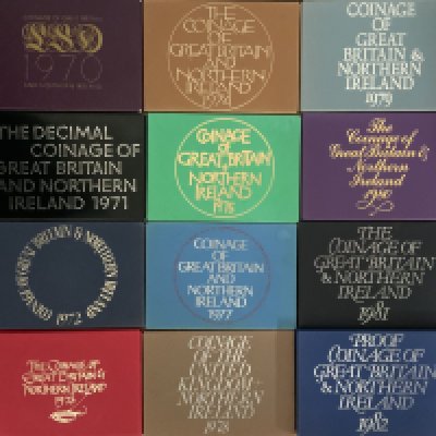 13 Royal Mint Great Britain coin sets, 1970, 71, 72, 73, 74, 75, 77,78, 79, 80, 81, x2 82.