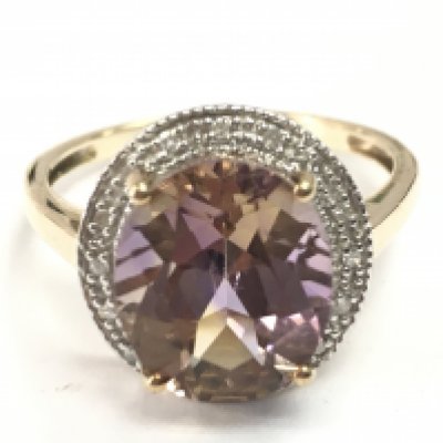 A 9 carat gold Morganite ring, 4.1g total weight. Size S Postage category a.