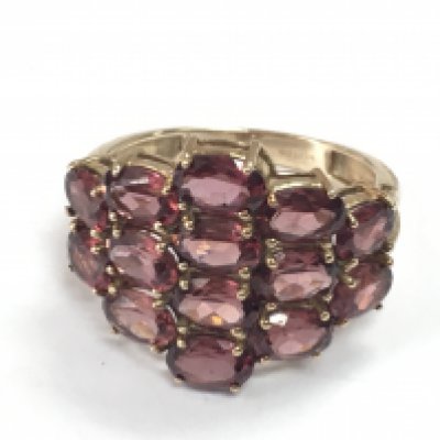 A 9ct gold rhodolite 14 stone ring. Size S . 4.5g total weight Postage category A
