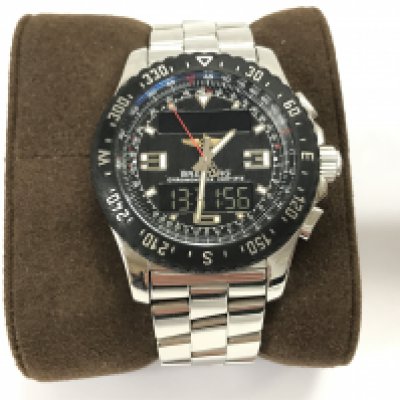 A gents Breitling Airwolf watch quartz movement with stainless steel strap and also a rubber strap. With box and some paperwork. Working. Postage B