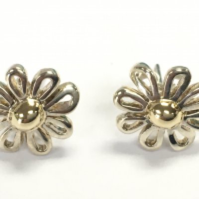 A Tiffany and Co pair of Elsa flower studs. Postage B
