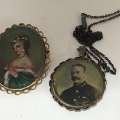 A 9carat gold brooch of oval shape with a portrait of a lady with applied stones and one other vintage double sided portrait pendent (2)