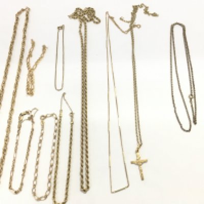 A collection of assorted 9ct gold chains 45g and on yellow metal one. Postage B