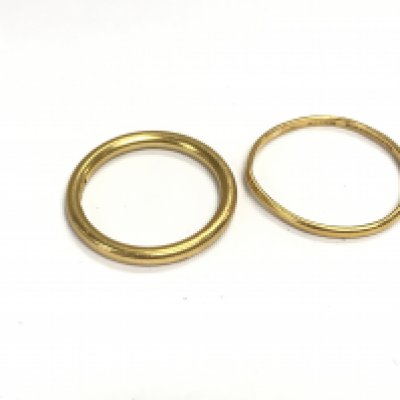 Two 22ct gold bands. Total weight 7.6g Postage A