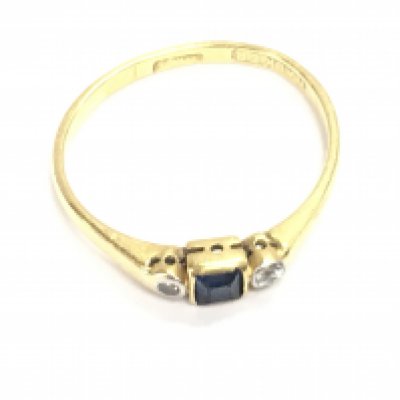 An 18ct sapphire and diamond ring size J 1/2 1.38g. Note ring is out of shape.