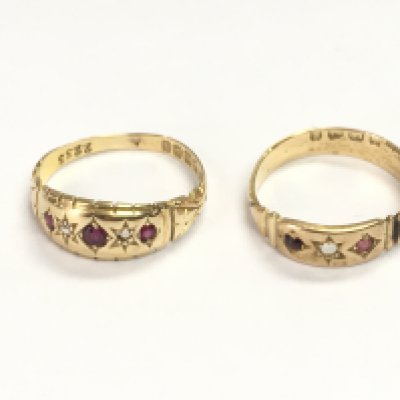 Two 18ct gold rings set with small rubys. Size P and N 1/2 5.97g