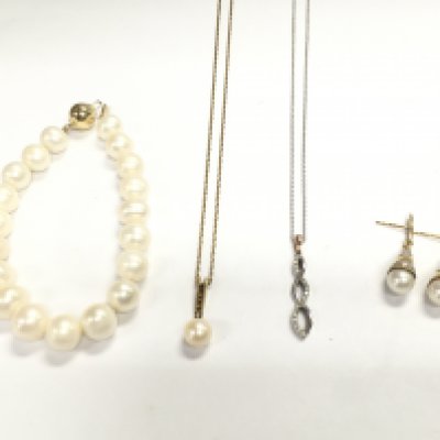 A pair of 9ct gold pearl earrings a pearl bracelet with a 14ct clasp a 9ct gold necklace with pearl pendant and an 18ct white gold chain with 9ct pendant.
