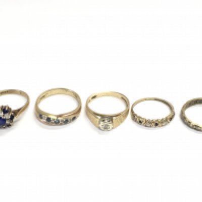 Five 9ct gold rings set with chip diamonds and coloured stones. Total weight 9.58g