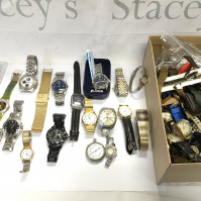 A box of mixed watches including pulsar Accurist Swatch D&G etc Postage B