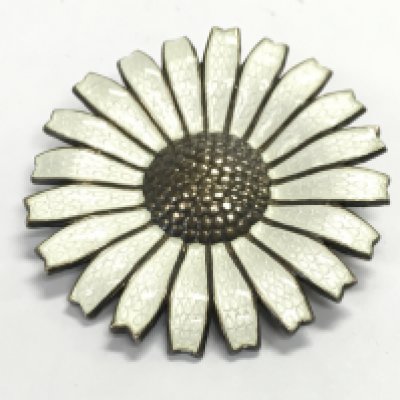A Danish sterling silver and enamelled flower brooch by Anton Michelsen.