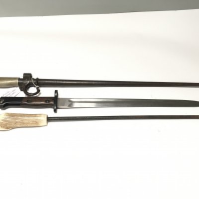 A French stick bayonet 1886 Label pattern with a steel scabbard one other unmarked Mauser bayonet and a horn handled long spike (3)
