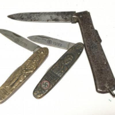 Two German Third Reich Adolf Hitler brass cased folding pocket knifes with German swastika etched blades and one other German knife the K55K maker Mercato Solingen (3)