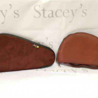 Two leather and sheep skin pistol cases. postage category B NO RSERVE
