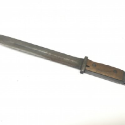A German Third Reich Afrika Korps bayonet the etched blade Deutsches Afrika Korps the reverse with further etching and dated 1941 the top fitting with a f etched palm tree symbol. No scabbard length 38cm