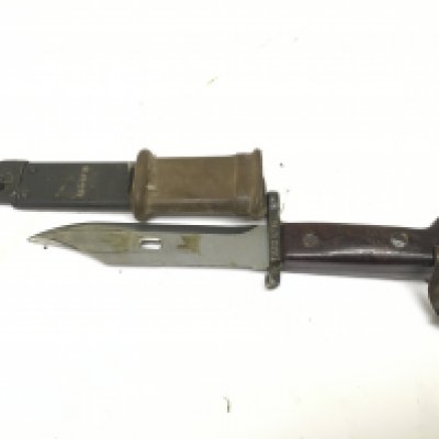 An early example Military AK67 bayonet with Bowie type blade with saw edge stamped AEG 0718.NO RESERVE