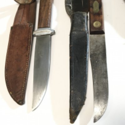 A collection of Vintage hunting knives The Bushmans Friend maker Maleham & Yeomans Sheffield a Frank Mills fighting knife and three other. (5)