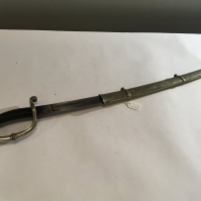 A Sabre sword with wired grip the guard with stylised acanthus leaves the blade with the marks Frans Pauwes possible Dutch.