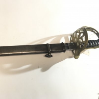 A German Imperial Sword possible 1890 Leopold III with brass Guard wood grip the blade stamped WRK with steel scabbard