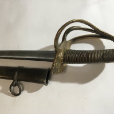 A Saber Cavalry sword with wire grip open basket guard with folate ornamentation steel scabbard.